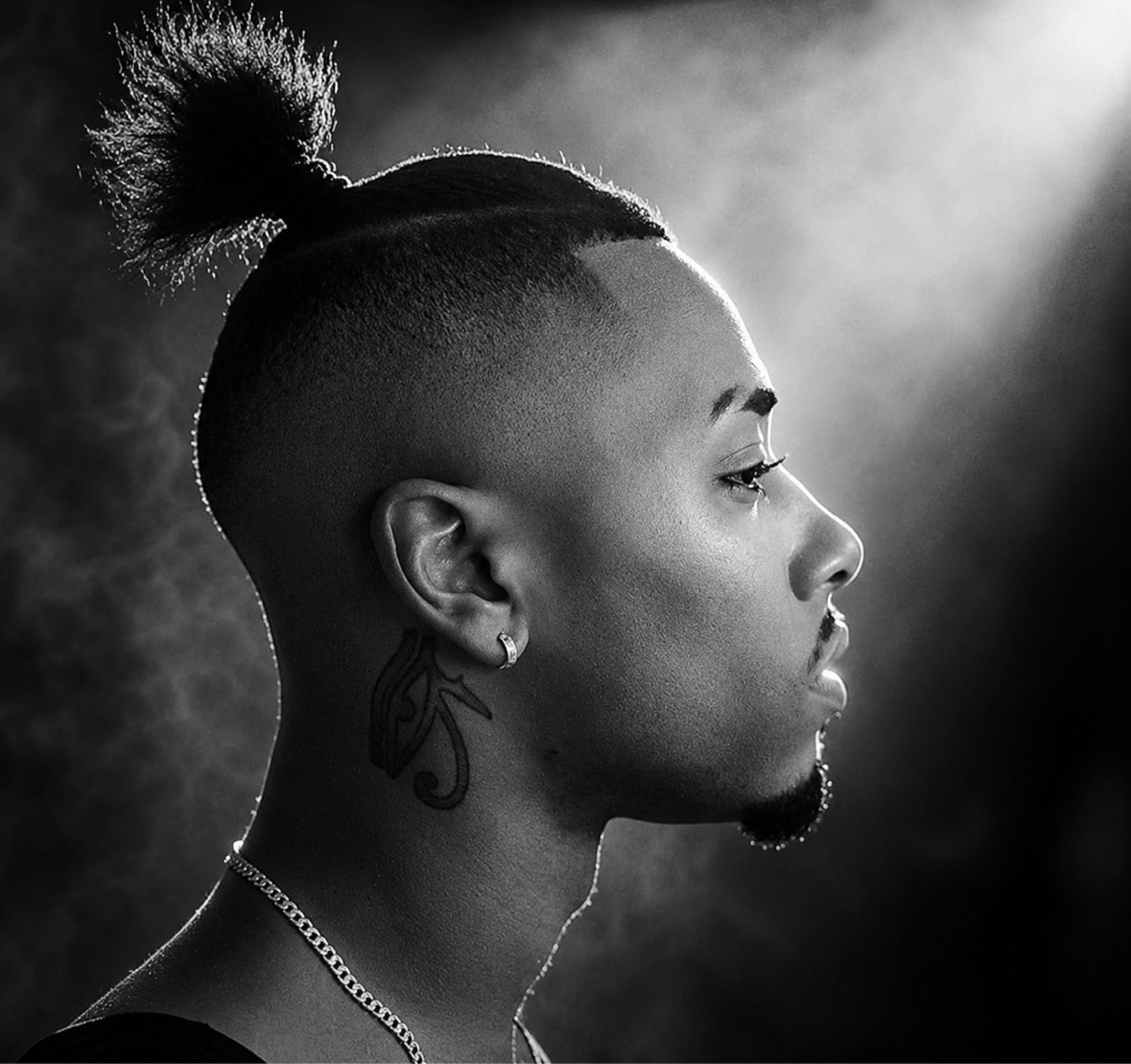 Arik Divine — signature side profile